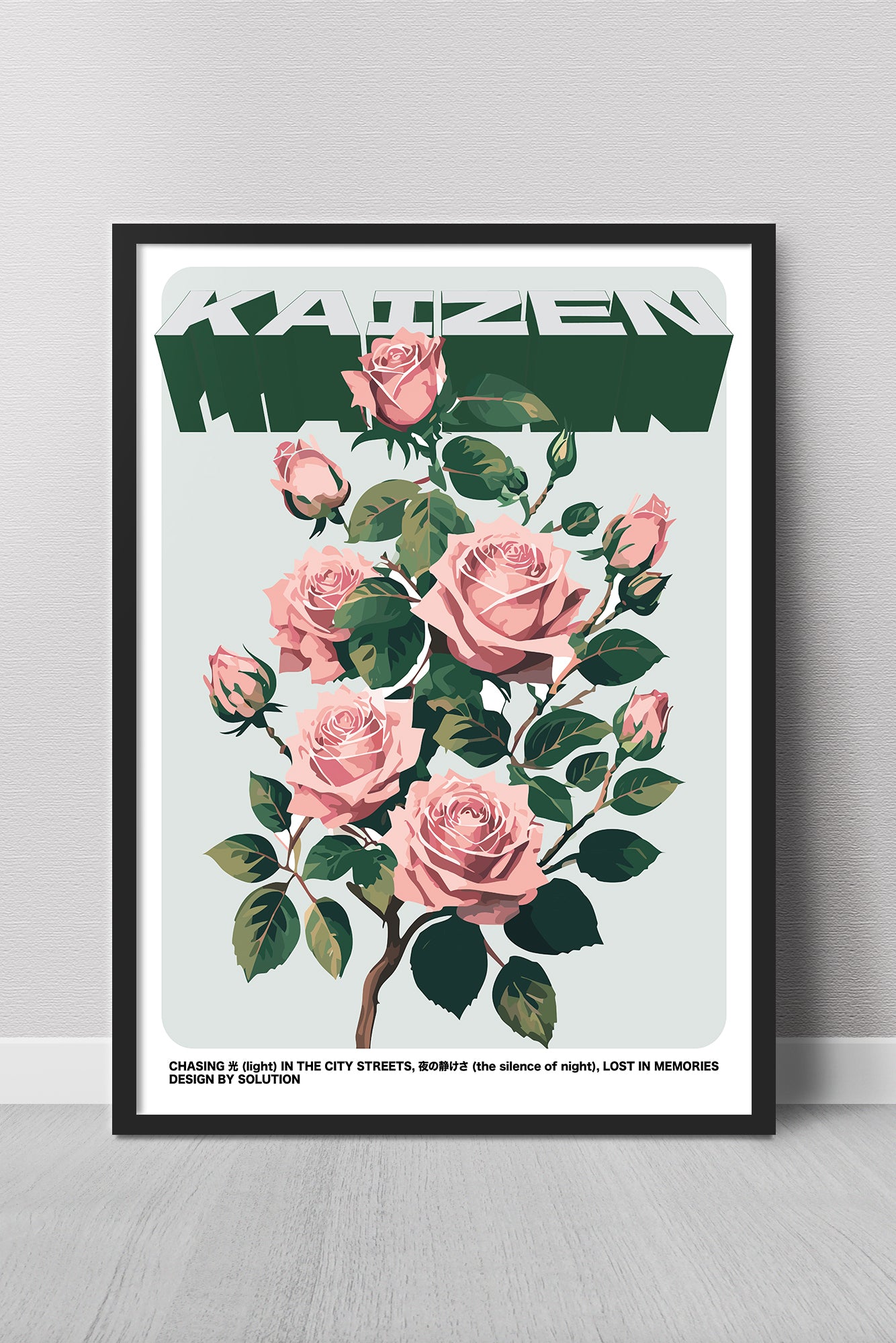 Framed poster with pink roses and text on a light gray wall.