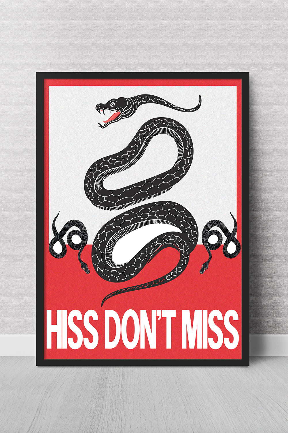 Framed poster with a black snake illustration and text 'HISS DON'T MISS' on a red background.