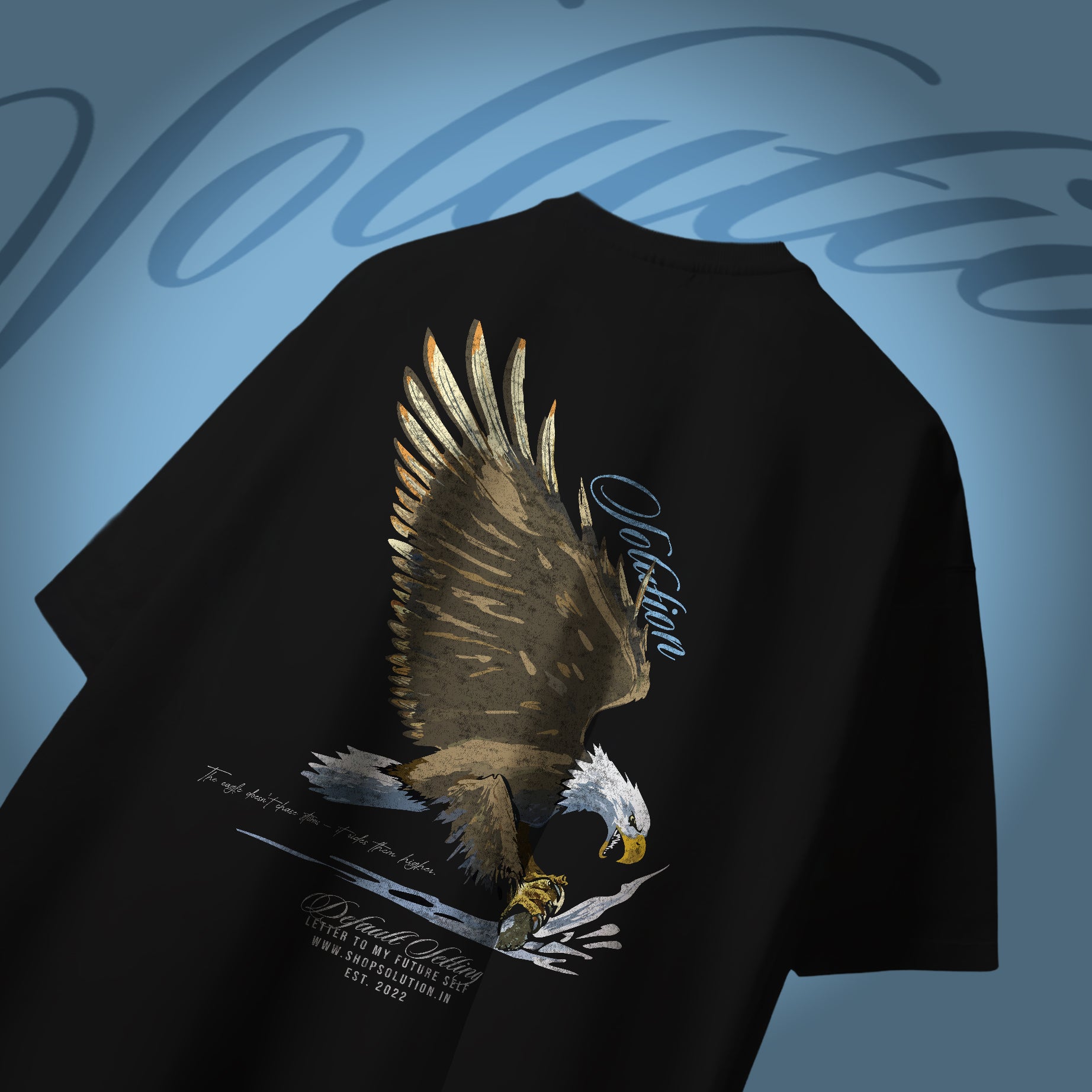 Black t-shirt with an eagle design on a blue background