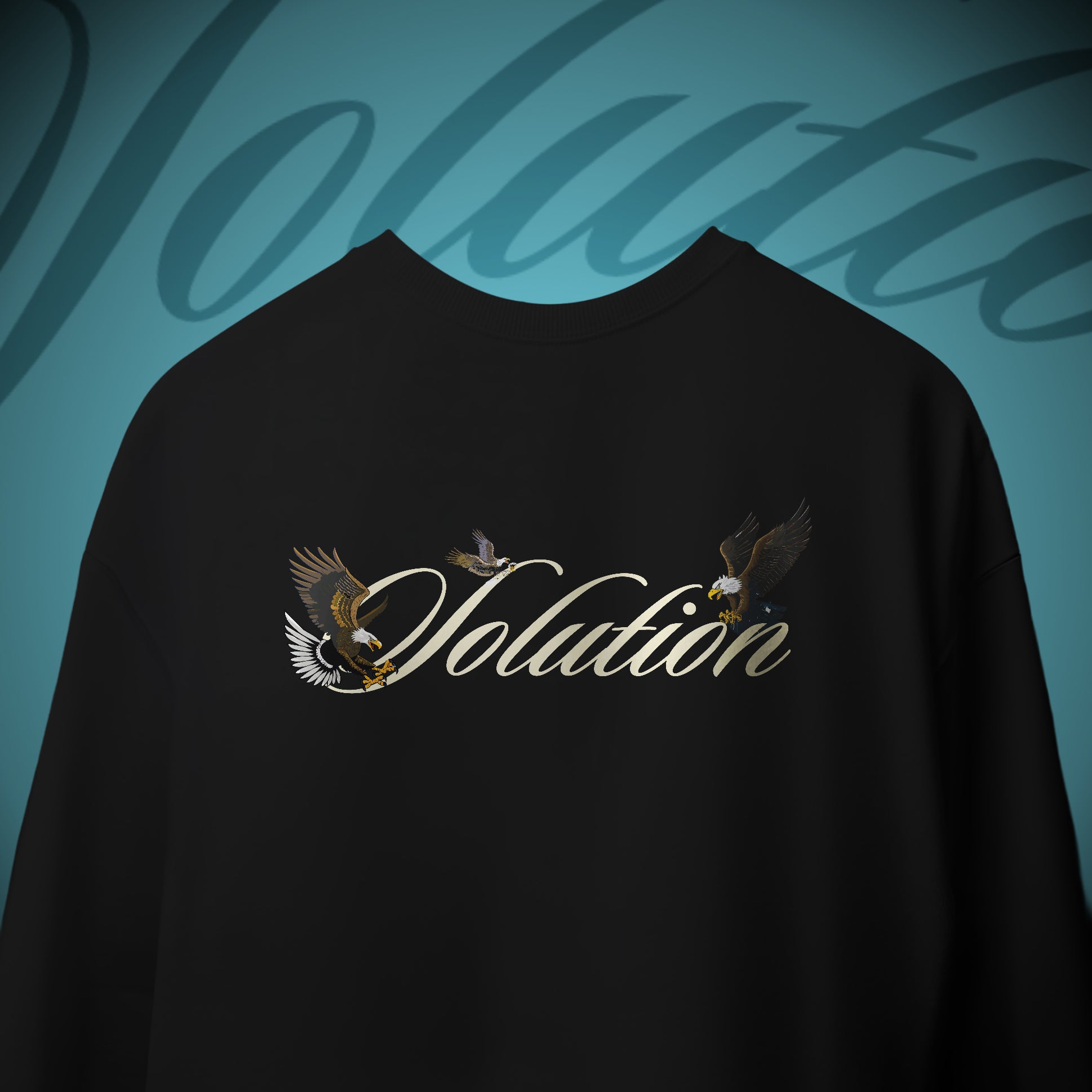 Black t-shirt with 'Volution' logo featuring eagles on a teal background