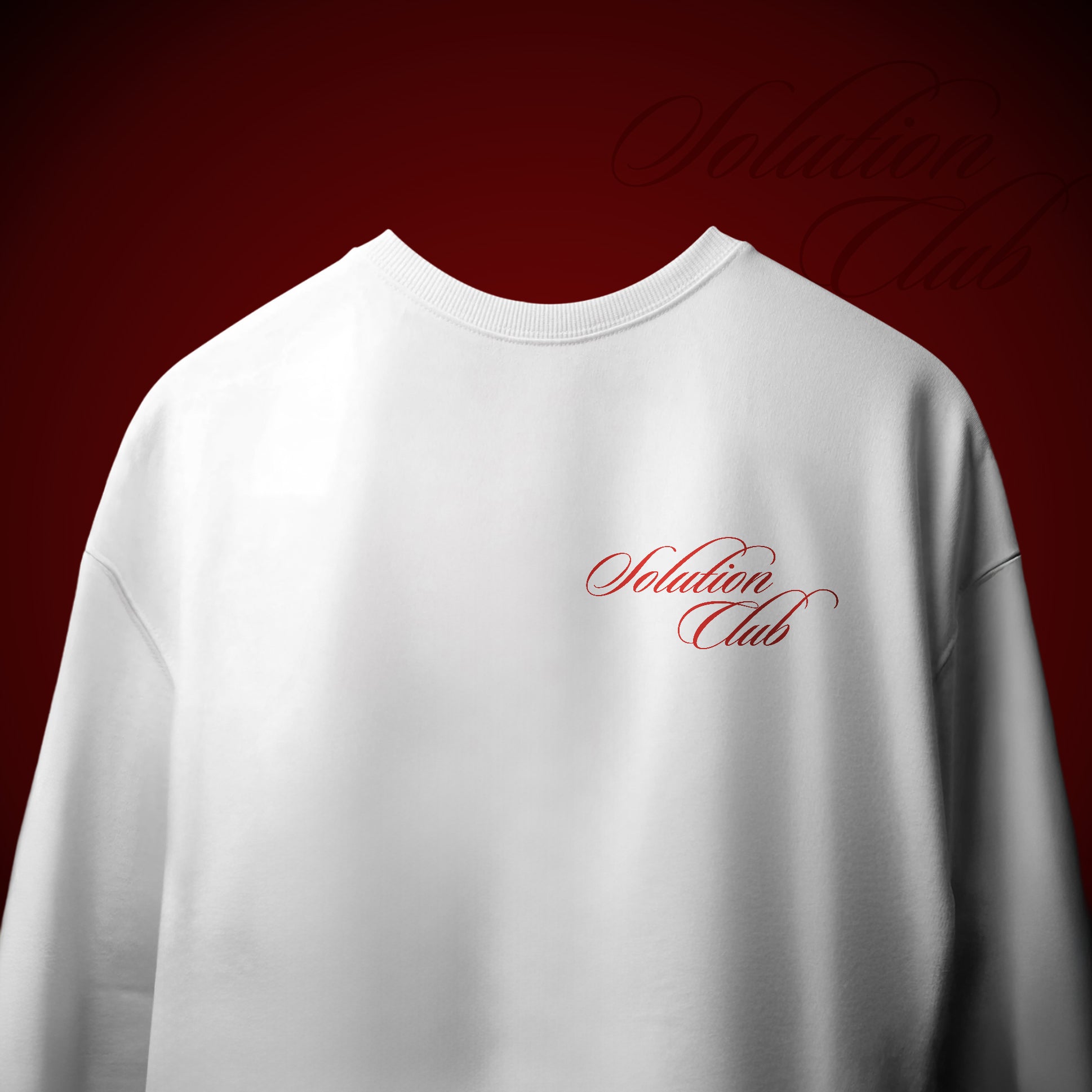 White t-shirt with 'Solution Club' text on a red background
