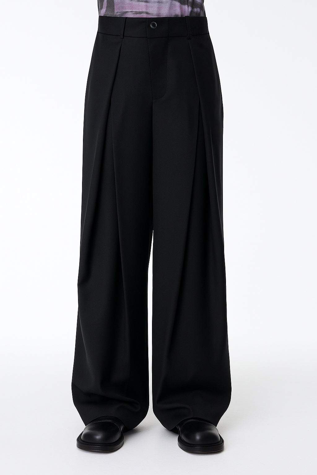 Black wide-leg pants on a white background