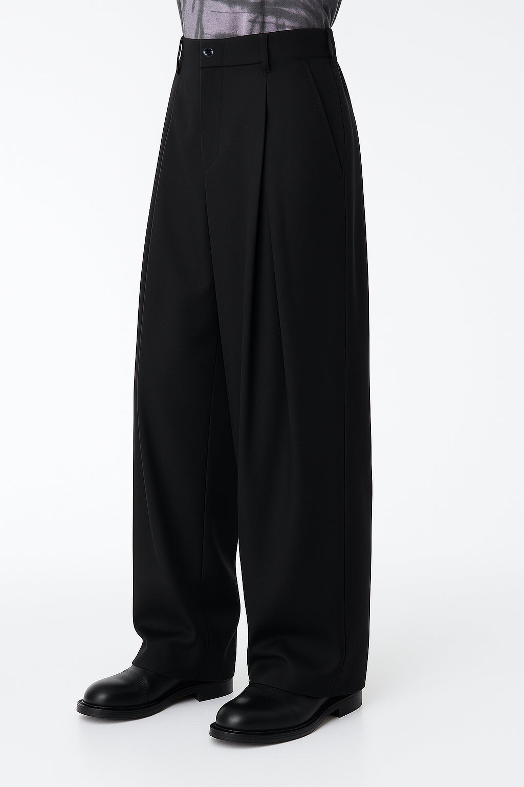 Black wide-leg pants worn by a person on a white background