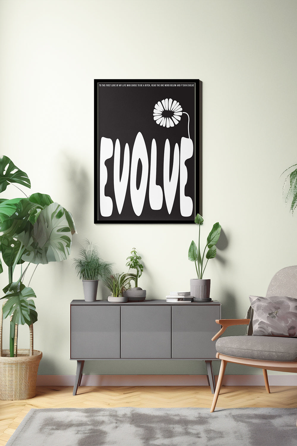 Framed artwork with 'EVOLVE' text in a modern living room setting.